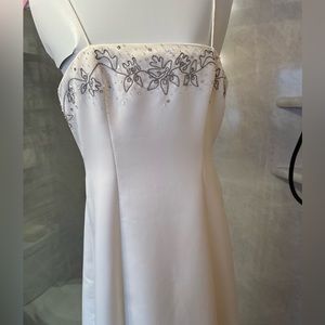 Betsy and Adam size 8 ivory formal dress.  Beautiful, comfortable and sexy!